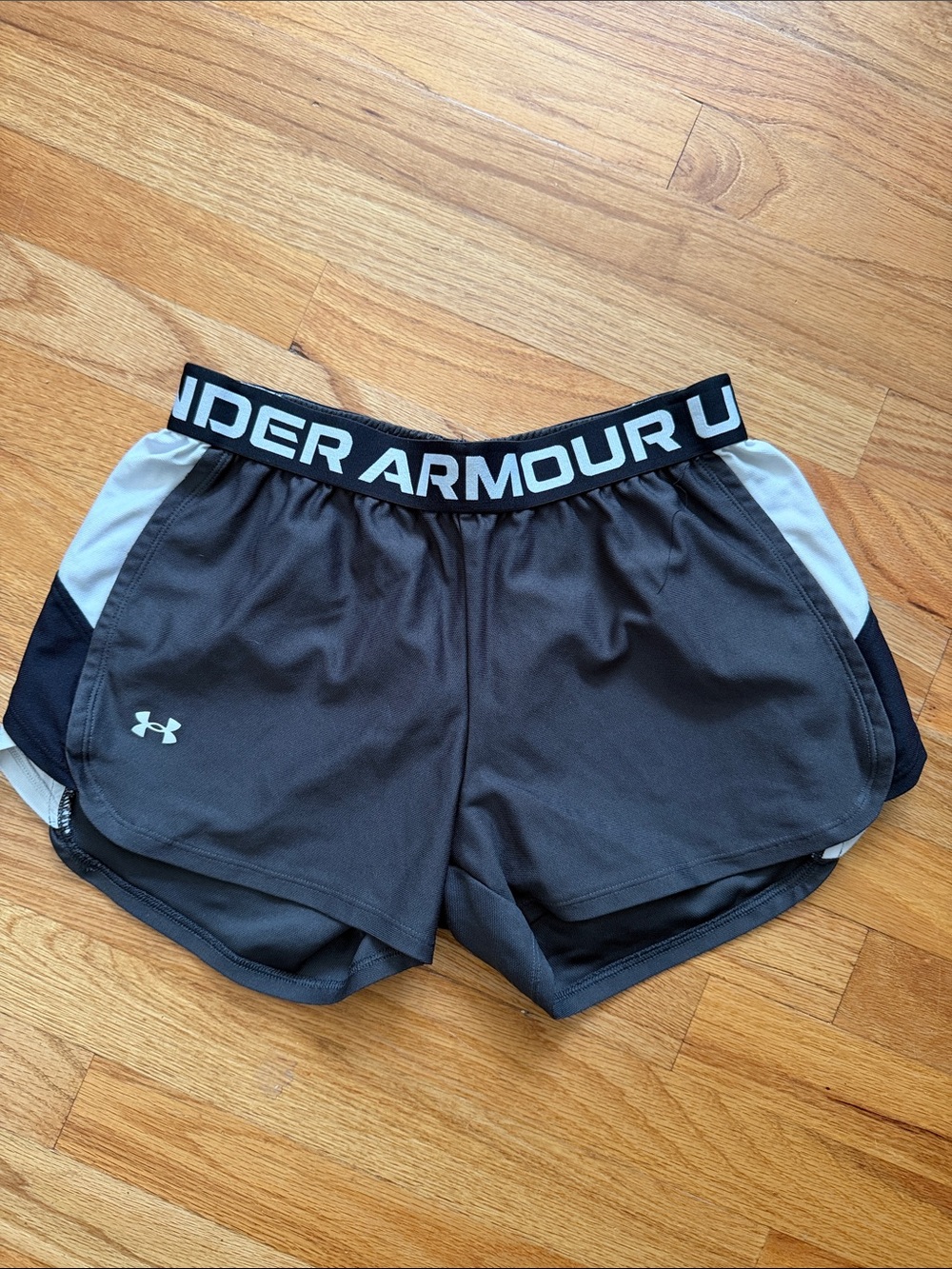 Under Armour Black Athletic Shorts with White Side Panels and Logo Waistband